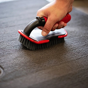 Heavy-duty Tire and Carpet Scrub Brush by Rocket Science Alliance for removing tough stains with stiff bristles.