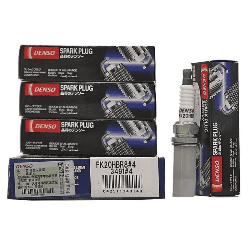 Set of four DENSO Iridium Long Life FK20HBR8 spark plugs with metal tips and ceramic insulators for automotive engine performance.