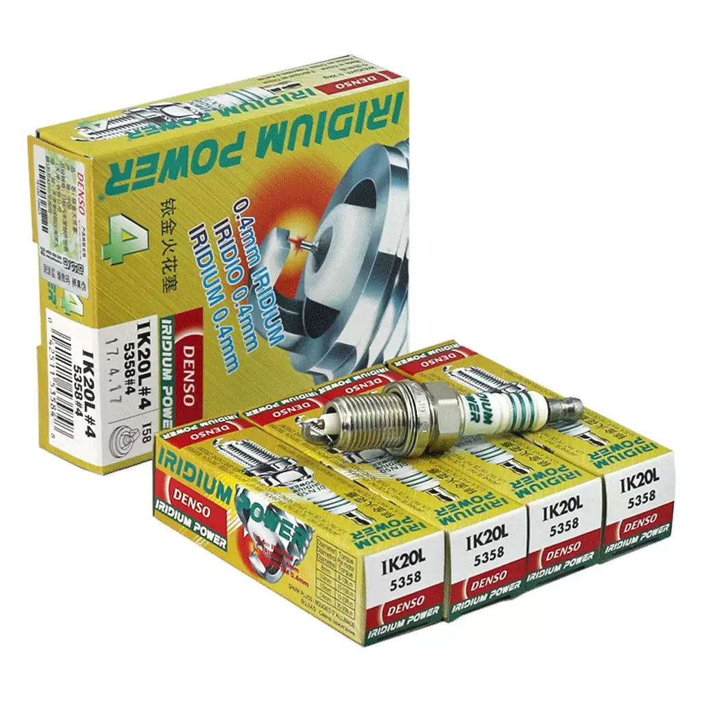 Set of four DENSO Iridium Power IK20L spark plugs, high-performance automotive ignition components with durable iridium tips.