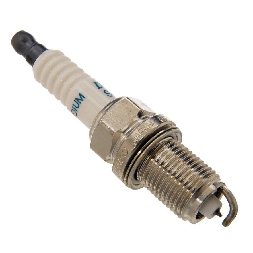 Set of four DENSO KH20TT iridium spark plugs for vehicle ignition systems, showing the spark plug design with metal and ceramic components.