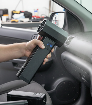 Rocket Science Alliance Car Air Duster Spot Remover shown with nozzle and compressed air for car cleaning and dust removal.