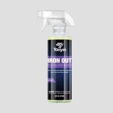 Rocket Science Alliance Iron & Fallout Remover cleaner with professional Iron Eater formula dissolving iron stains on vehicle surfaces.