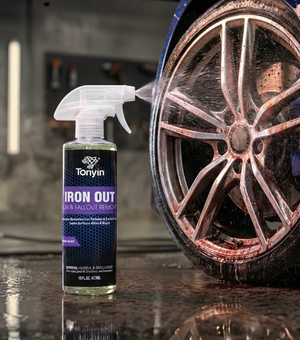 Rocket Science Alliance Iron & Fallout Remover cleaner dissolving iron stains on vehicle surface for professional auto detailing.