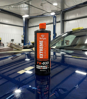 Rocket Science Alliance Extreme Heavy Cut TX033A 1L bottle, showcasing the thick automotive polish with detailed label and packaging