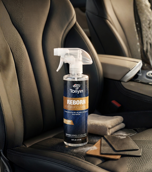 Rocket Science Alliance Reborn Leather Cleaner bottle showing its label and sleek design, suitable for cleaning various leather surfaces.