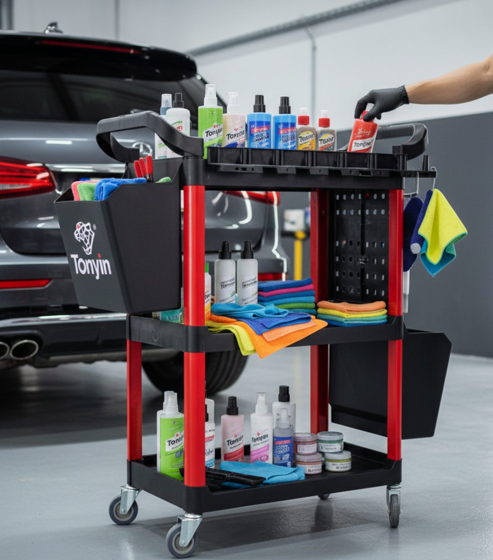 Heavy-duty detailing cart by Rocket Science Alliance with multiple storage compartments and sturdy wheels for professional car care.