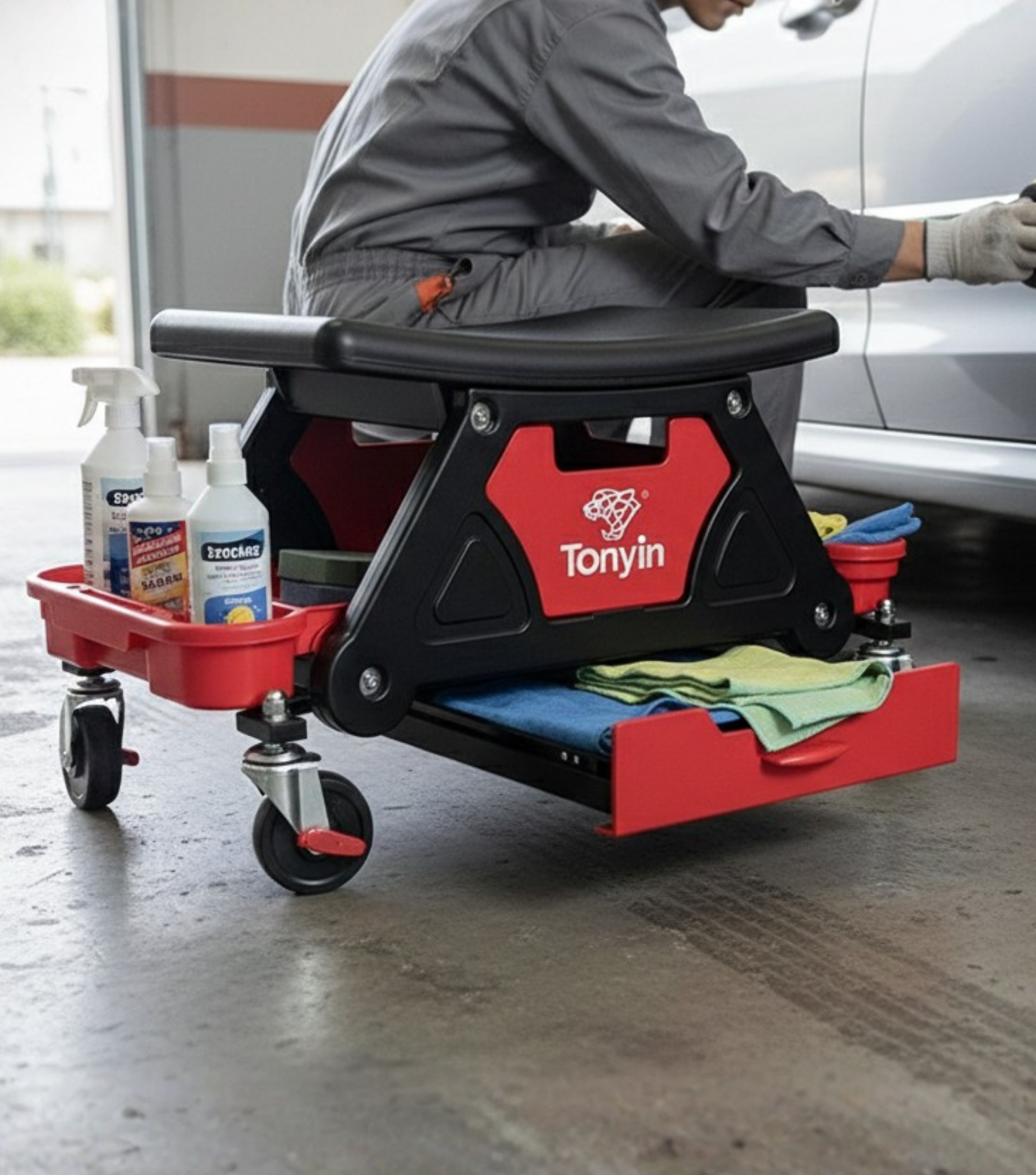 Rocket Science Alliance Detailing Creeper Seat TT28 for spot removal, with padded cushion and adjustable height for comfortable vehicle detailing.